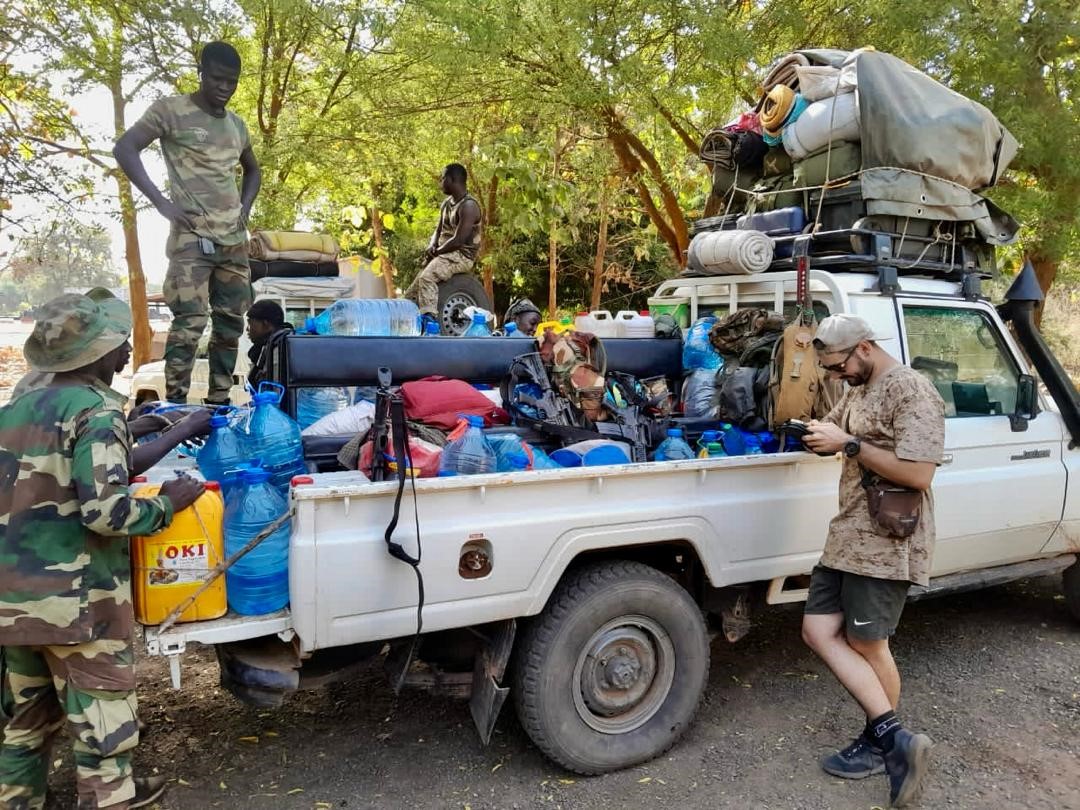 One group, consisting of two teams, loads their equipment onto their vehicle whilst getting ready to travel to their first base – having to get creative with the packing!