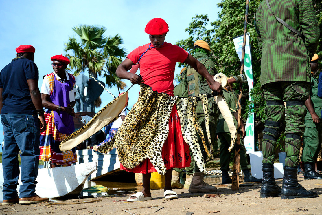 A Lozi member tries on a Heritage Fur lipatelo or skirt at the 2025 Kuomboka in Zambia.