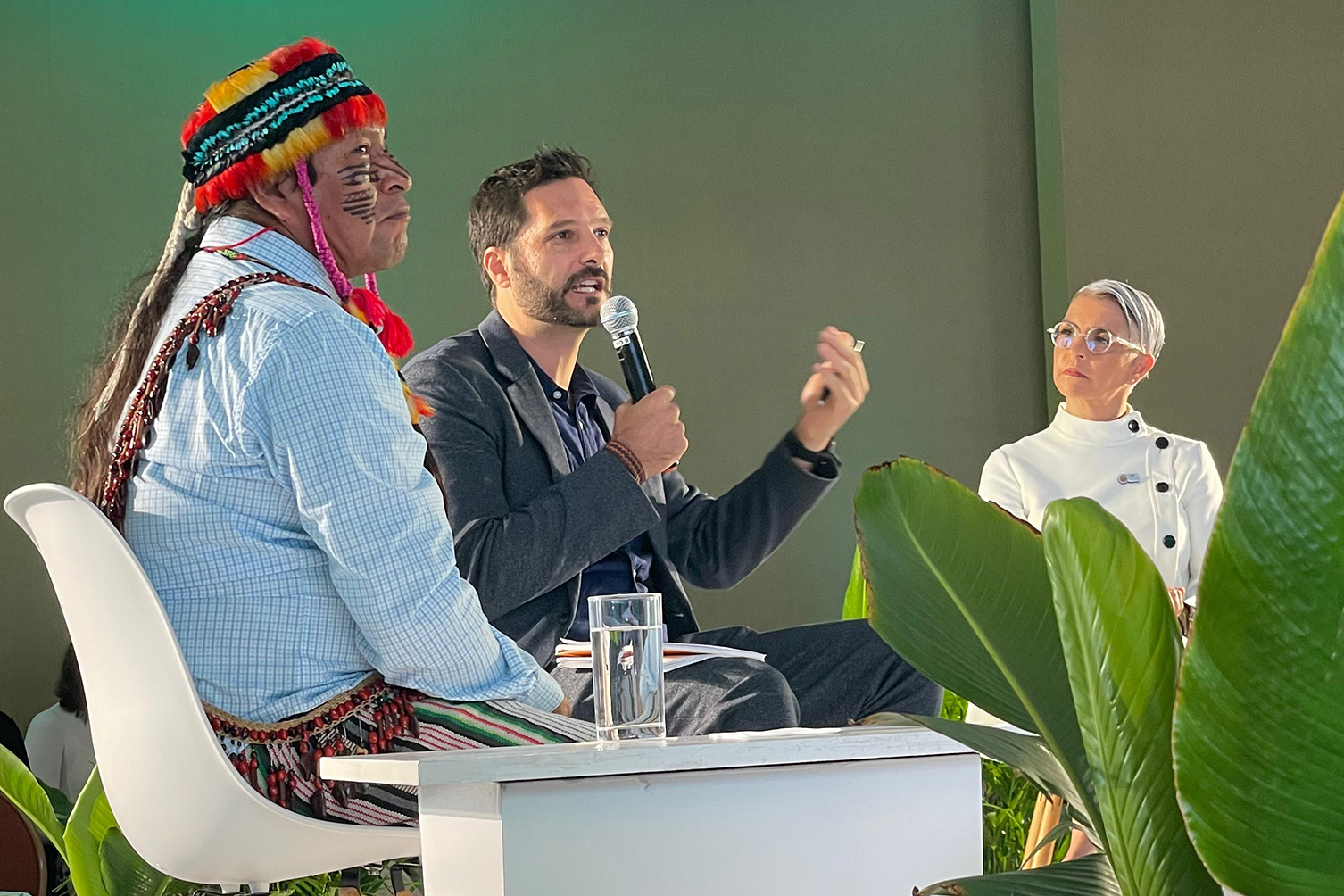 Three people on stage