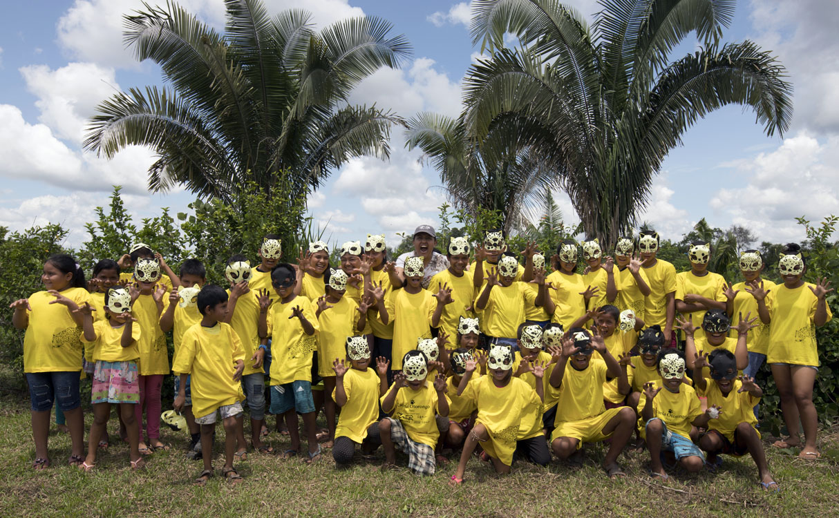 Students at Panthera's Jaguar School in Colombia wearing cat masks